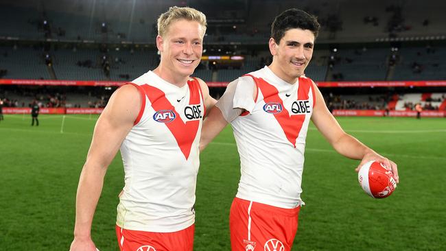 Isaac Heeney (left) is enjoying one of his best seasons in Sydney. Picture: Morgan Hancock/AFL Photos/via Getty Images