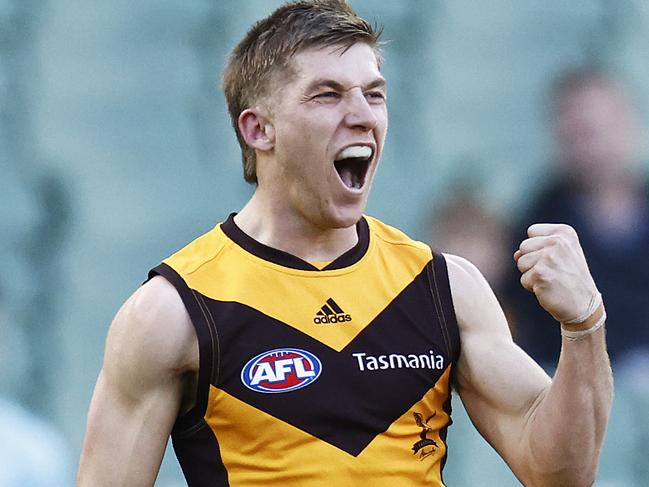 MELBOURNE, AUSTRALIA - JUNE 27: Dylan Moore of the Hawks celebrates a goal during the round 15 AFL match between the Greater Western Sydney Giants and the Hawthorn Hawks at Melbourne Cricket Ground on June 27, 2021 in Melbourne, Australia. (Photo by Daniel Pockett/Getty Images)