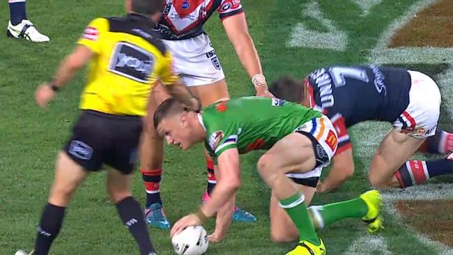 Jack Wighton prepares to play the ball as referee Ben Cummins tells him it is a changeover.