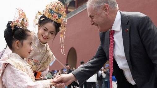 Trade Minister Don Farrell greets locals at the Forbidden City. Picture: Supplied