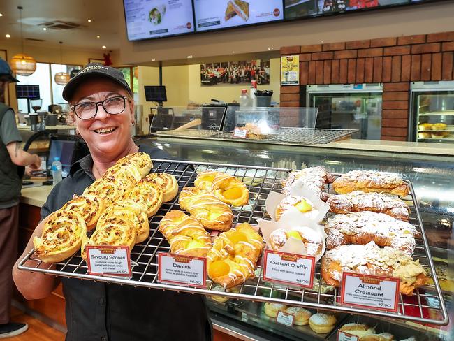 Beechworth Bakery Manager Jackie Ross holds a tray of pastries at the store in Healesville, Victoria. The high cost of living continues with the 2025 federal election due no later than May. Picture: Ian Currie