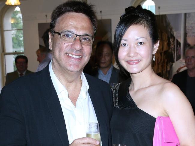 Michel and Coco Germani at the Billich Gallery Christmas Party at the Rocks  hosted by artist Charles Billich.