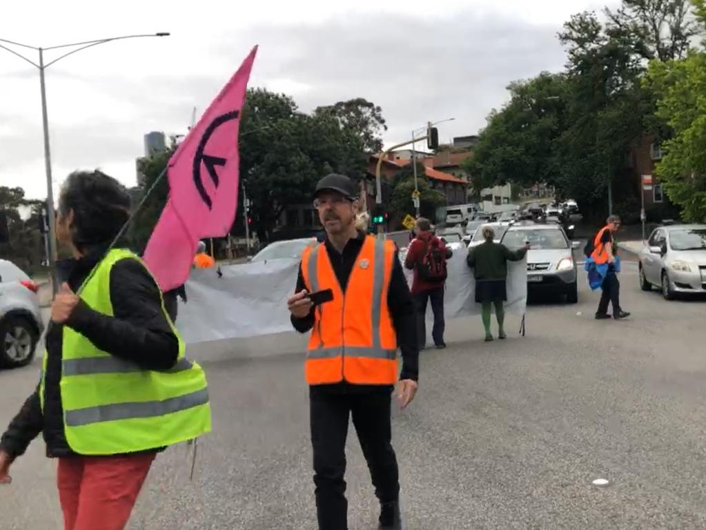 The protest has caused major chaos on the busy Melbourne overpass.