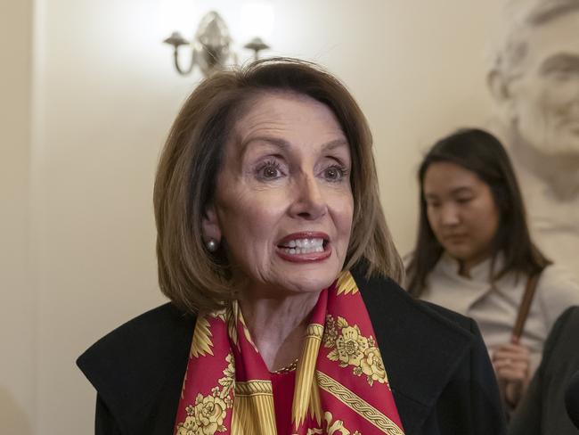 Speaker of the House Nancy Pelosi, D-Calif., responds to reporters after officially postponing President Donald Trump's State of the Union address until the government is fully reopened, at the Capitol in Washington, Wednesday, Jan. 23, 2019. The California Democrat told Trump in a letter Wednesday the Democratic-controlled House won't pass the required measure for him to give the nationally televised speech from the House floor. (AP Photo/J. Scott Applewhite)