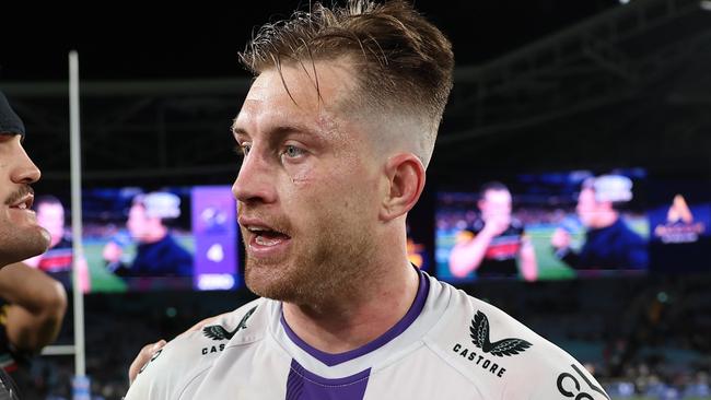 SYDNEY, AUSTRALIA - SEPTEMBER 22:  Cameron Munster of the Storm and Nathan Cleary of the Panthers embrace following the NRL Preliminary Final match between the Penrith Panthers and Melbourne Storm at Accor Stadium on September 22, 2023 in Sydney, Australia. (Photo by Matt King/Getty Images)