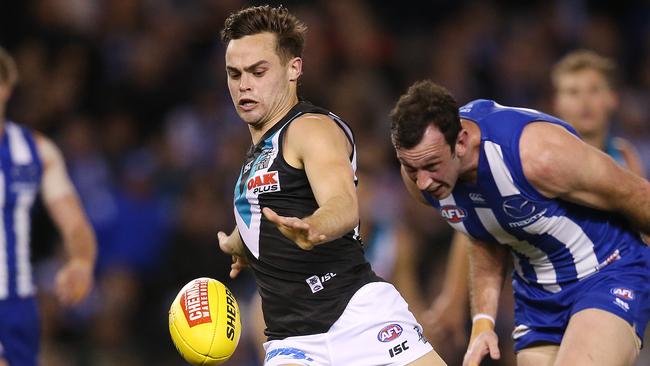 Karl Amon goals on the run during Port Adelaide’s loss to North Melbourne. Picture: Michael Klein.