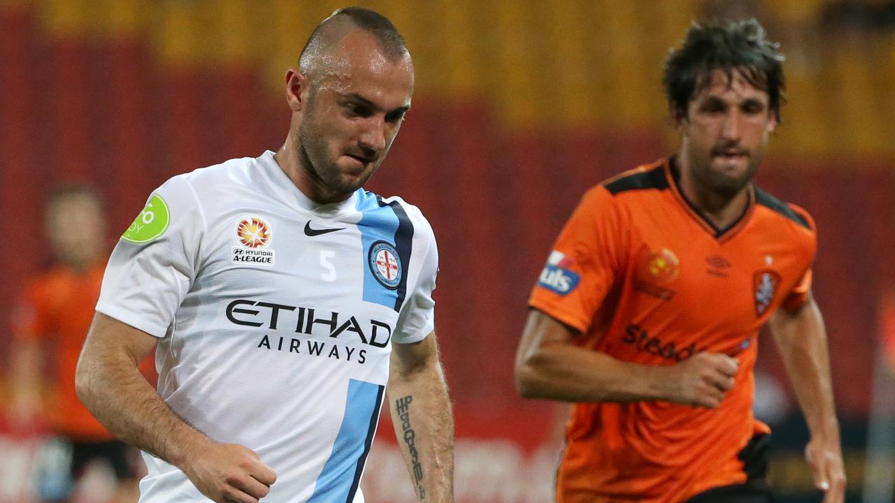 Ivan Fanjic and Thomas Broich. Brisbane Roar Vs Melbourne City at Suncorp Stadium. Pic Jono Searle.
