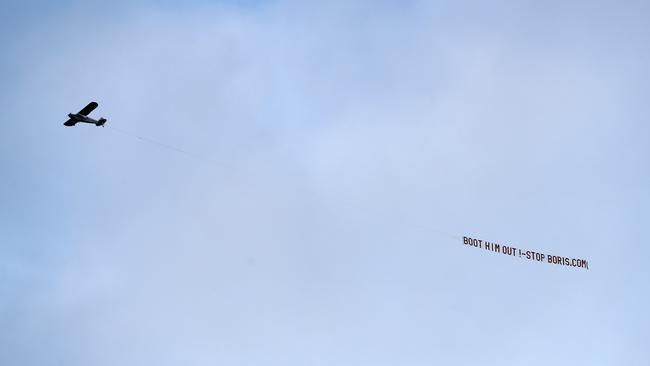 A plane flies over a Premier League match with a message for Boris Johnson. Picture: George Wood/Getty Images