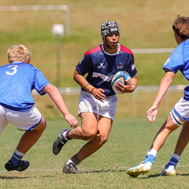 Buildcorp Emerging Reds Cup action from the day one match between Queensland Country Under-14s and Brisbane Junior Rugby Union Under-14s. Picture credit: QRU Media/ Erick Lucero.