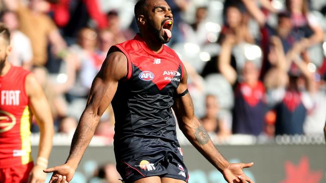 Lumumba celebrates a goal in his first game for Melbourne. Picture: Colleen Petch.