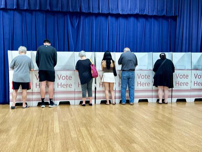Pre-Polls - Generic polling booth picture. People voting (Southport Community Centre).NO BYLINE