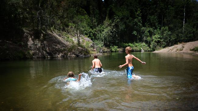 Lauren Le Clerk, Jack McNamara and Joel Le-Clerk enjoy the water hole at Cedar Grove