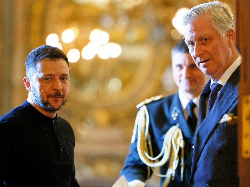 King Philippe of Belgium (R) welcomes Ukraine's President Volodymyr Zelensky (L) to the Royal Palace, on the sidelines of the Special European Council, in Brussels. Picture: AFP