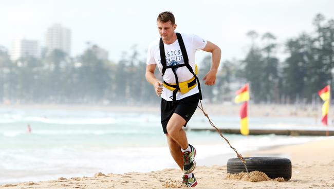 Former Wallaby Dean Mumm trains on Manly Beach. Picture: Tim Hunter.