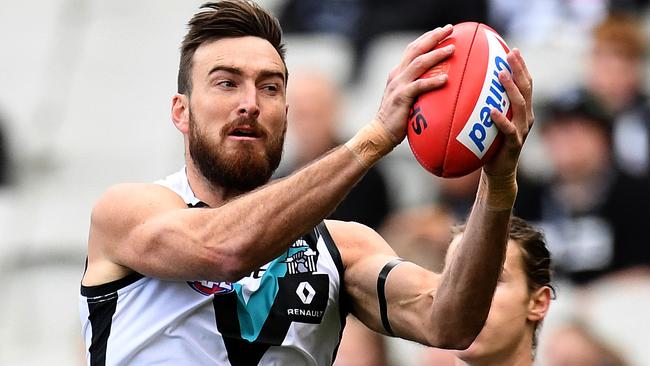 Charlie Dixon takes a mark against Collingwood. Chris McDermott says he and his fellow Port Adelaide forward line “bigs” must have more impact on the scoreboard. Picture: Julian Smith (AAP)