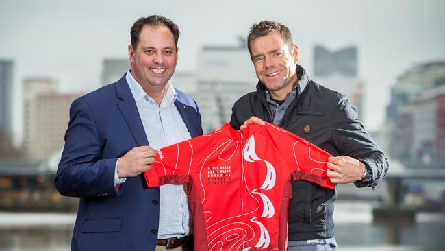 Small Business Minister Philip Dalidakis (left, with Cadel Evans) has backed the holiday. Picture: Mark Stewart