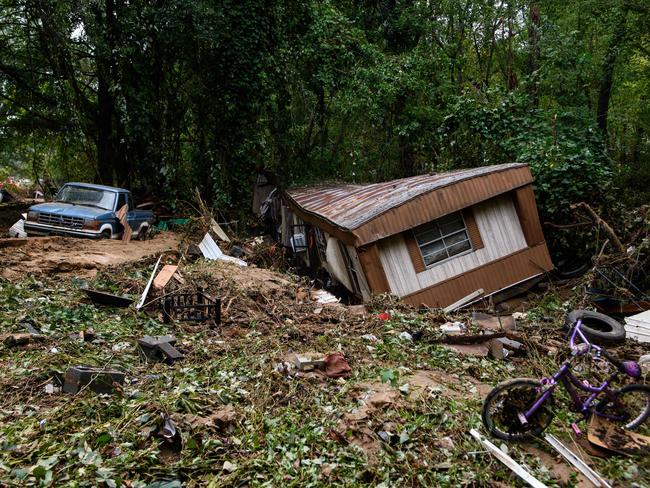 Debris and a mobile home are piled up along a tree line in the aftermath of Hurricane Helene in Old Fort, North Carolina. Picture: AFP