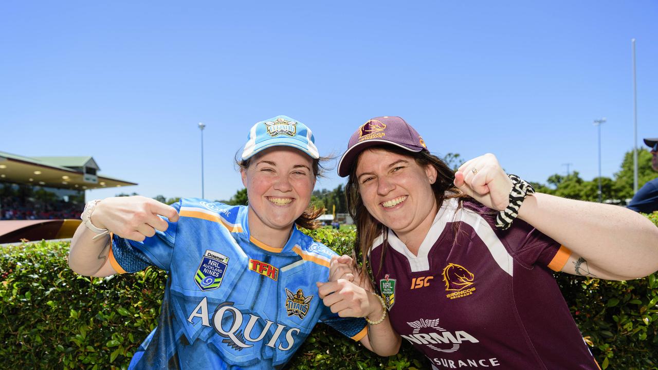 Oakey sisters Karina Barron (left) and Natasha Swain show their support for opposing teams at the NRL Pre-Season Challenge game between Broncos and Titans at Toowoomba Sports Ground, Sunday, February 16, 2025. Picture: Kevin Farmer