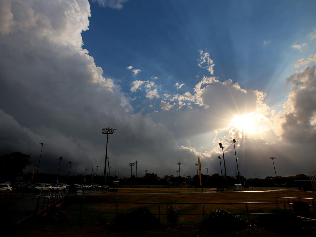 The sun shines through storm clouds, Rooty Hill, Sydney, 14th March, 2019. Picture: Damian Shaw