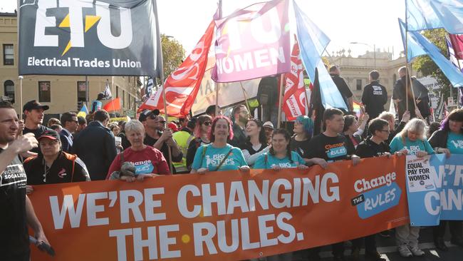 Protesters make their way along Spring St. Picture: David Crosling