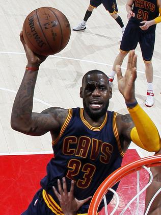 ATLANTA, GA - MAY 22: LeBron James #23 of the Cleveland Cavaliers goes up against the Atlanta Hawks in the third quarter during Game Two of the Eastern Conference Finals of the 2015 NBA Playoffs at Philips Arena on May 22, 2015 in Atlanta, Georgia. NOTE TO USER: User expressly acknowledges and agrees that, by downloading and or using this Photograph, user is consenting to the terms and conditions of the Getty Images License Agreement. (Photo by Kevin C. Cox/Getty Images)