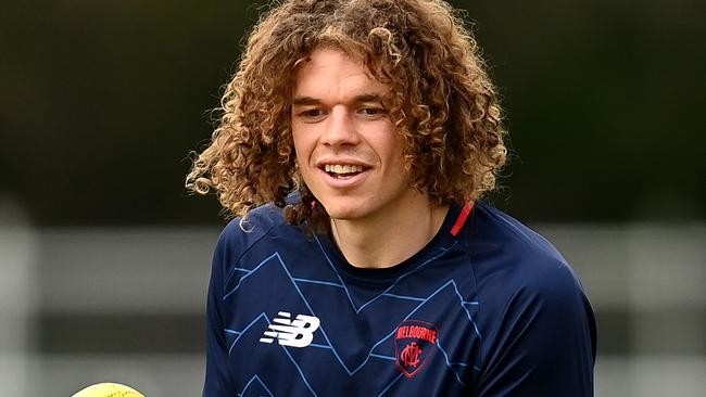 MELBOURNE, AUSTRALIA - MARCH 28: Ben Brown of the Demons handballs during a Melbourne Demons AFL training session at Gosch's Paddock on March 28, 2022 in Melbourne, Australia. (Photo by Quinn Rooney/Getty Images)