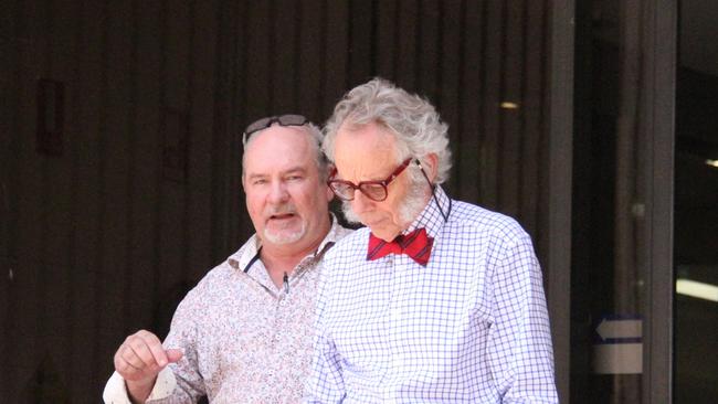 DLI Housing program officer general manager Dwayne Mcinnes leaves the Alice Springs Local Court with lawyer Tom Grace (representing the Department of Logistics and Infrastructure). Picture: Gera Kazakov