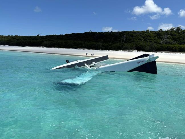 A Whitsunday Air Services plane crashed into waters off world-famous Whitehaven Beach with five people, a pilot and four passengers, on board. Picture supplied by Island FM Whitsundays