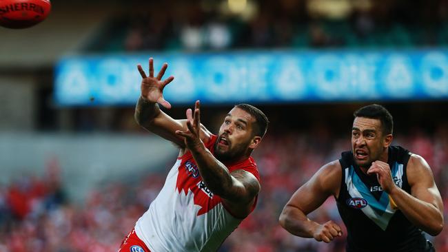 Lance Franklin prepares to mark in front of Port’s Alipate Carlile. Picture: Toby Zerna