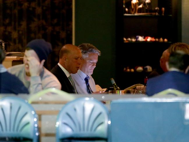 Peter Dutton and Mathias Cormann having dinner at Portia's. Picture: Jonathan Ng