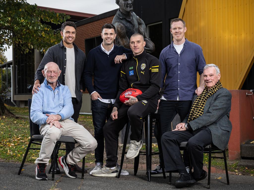 Martin with fellow Richmond 300 game players Kevin Bartlett, Shane Edwards, Trent Cotchin, Jack Riewoldt and Francis Bourke. Picture: Michael Willson