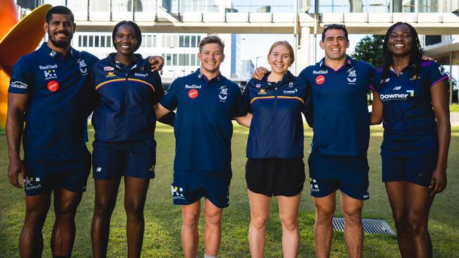 Tui Kamikamica, Phumza Maweni, Harry Grant, Maddie McAuliffe, Dale Finucane and Peace Proscovia from the Melbourne Storm and Sunshine Coast Lightning at the Sunshine Coast University Hospital.