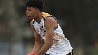 MELBOURNE, AUSTRALIA - SEPTEMBER 19: Tevita Rodan of World Team looks to pass the ball during Game 1 of the 2023 AFL Flying Boomerangs v World Team Diversity Series exhibition games at Trevor Barker Oval on September 19, 2023 in Melbourne, Australia. (Photo by Daniel Pockett/AFL Photos/Getty Images via AFL Photos)