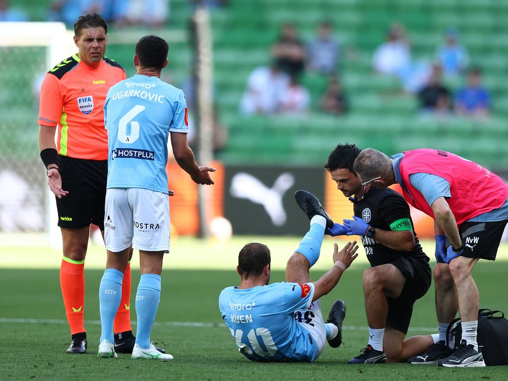 MELBOURNE, AUSTRALIA – JANUARY 03: Andreas Kuen of Melbourne City (C) receives attention during the round 12 A-League Men match between Melbourne City and Wellington Phoenix at AAMI Park on January 03, 2025 in Melbourne, Australia. (Photo by Graham Denholm/Getty Images)