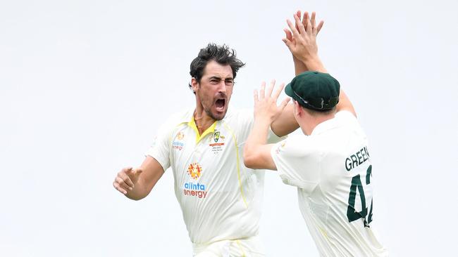 Mitchell Starc celebrates his famous first ball Ashes wicket of Rory Burns. Picture: AFP