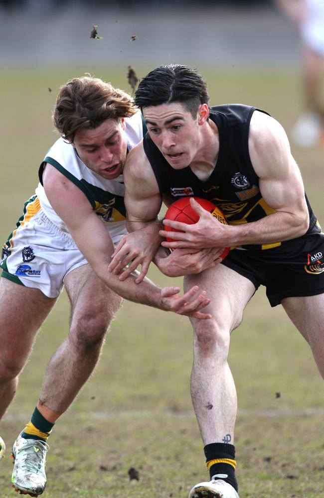 Colac v Leopold, senior footy. Leopold's James Edmonds and Colac's Bailey Scott. Picture: Mike Dugdale