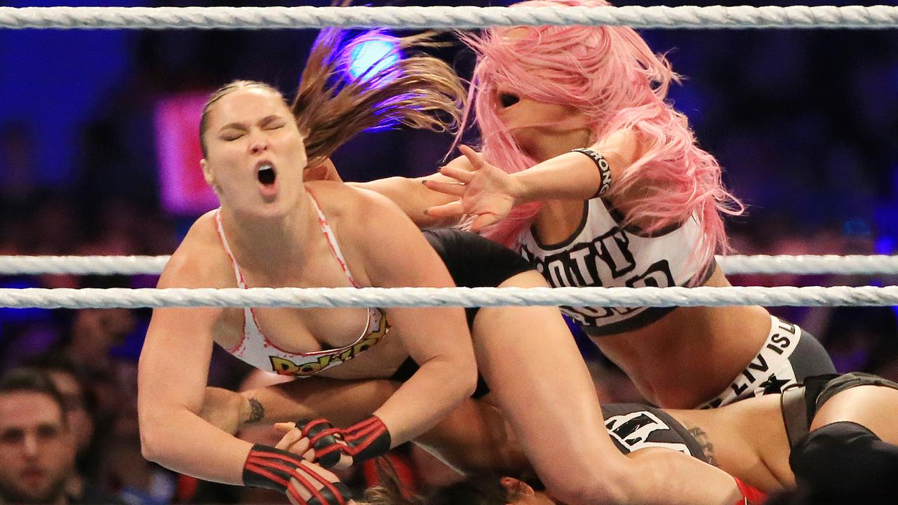 Rousey arrested in WWE 'total chaos' .
