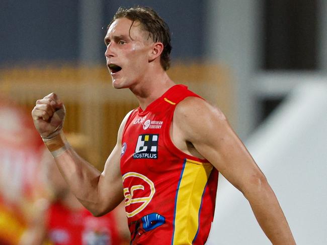 DARWIN, AUSTRALIA - MAY 11: Sam Clohesy of the Suns celebrates a goal during the 2024 AFL Round 09 match between the Gold Coast SUNS and North Melbourne Kangaroos at TIO Stadium on May 11, 2024 in Darwin, Australia. (Photo by Dylan Burns/AFL Photos via Getty Images)