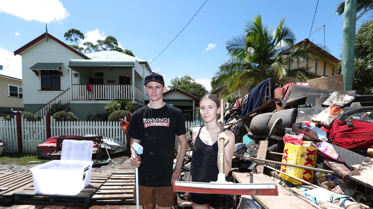 Local residents Ned Foster, 18, and Taya Dawson in South Lismore. Photo: Jason O'Brien