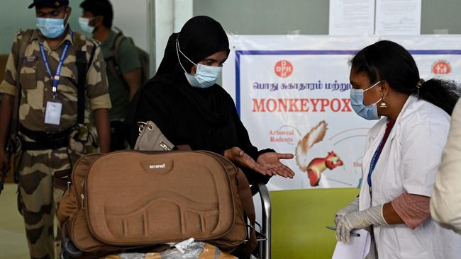 Health workers screen arriving international passengers for monkeypox symptoms at Anna International Airport in Chennai, in India, on June 3. Picture: AFP