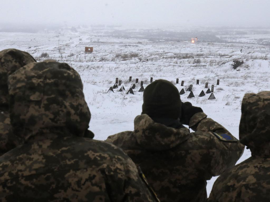 Ukrainian Military Forces servicemen attend a military drill. Britain, the United States and Baltic countries will be drawn into a war front according to a leaked report. Picture: AFP