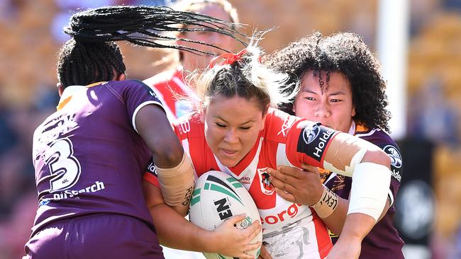 Keeley Davis is tackled during the NRL Women's Premiership match between the Brisbane Broncos and the St George-Illawarra Dragons.