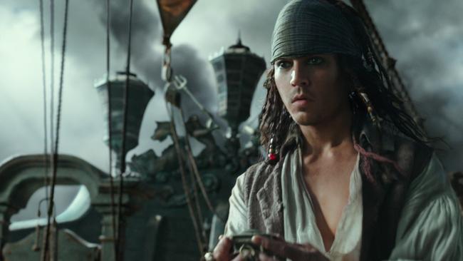 Young Jack Sparrow (Anthony De La Torre) on the deck of The Black Pearl at Helensvale in a scene from Pirates 5. Picture: Disney Enterprises.