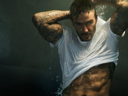 David Beckham strips off in steamy new ad