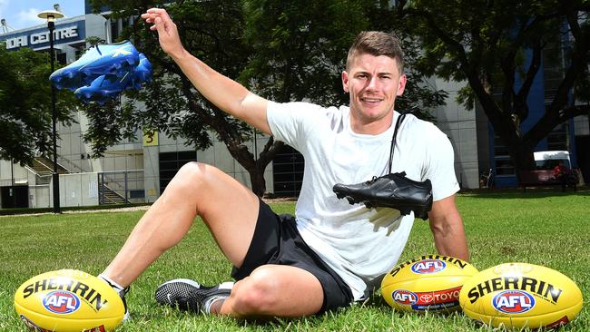 Lions star Dayne Zorko poses for a photograph out side the GABBA in Woolloongabba. Lions star Dayne Zorko changes his boots at the halftime of every game. Tuesday February 13, 2018. (AAP image, John Gass)