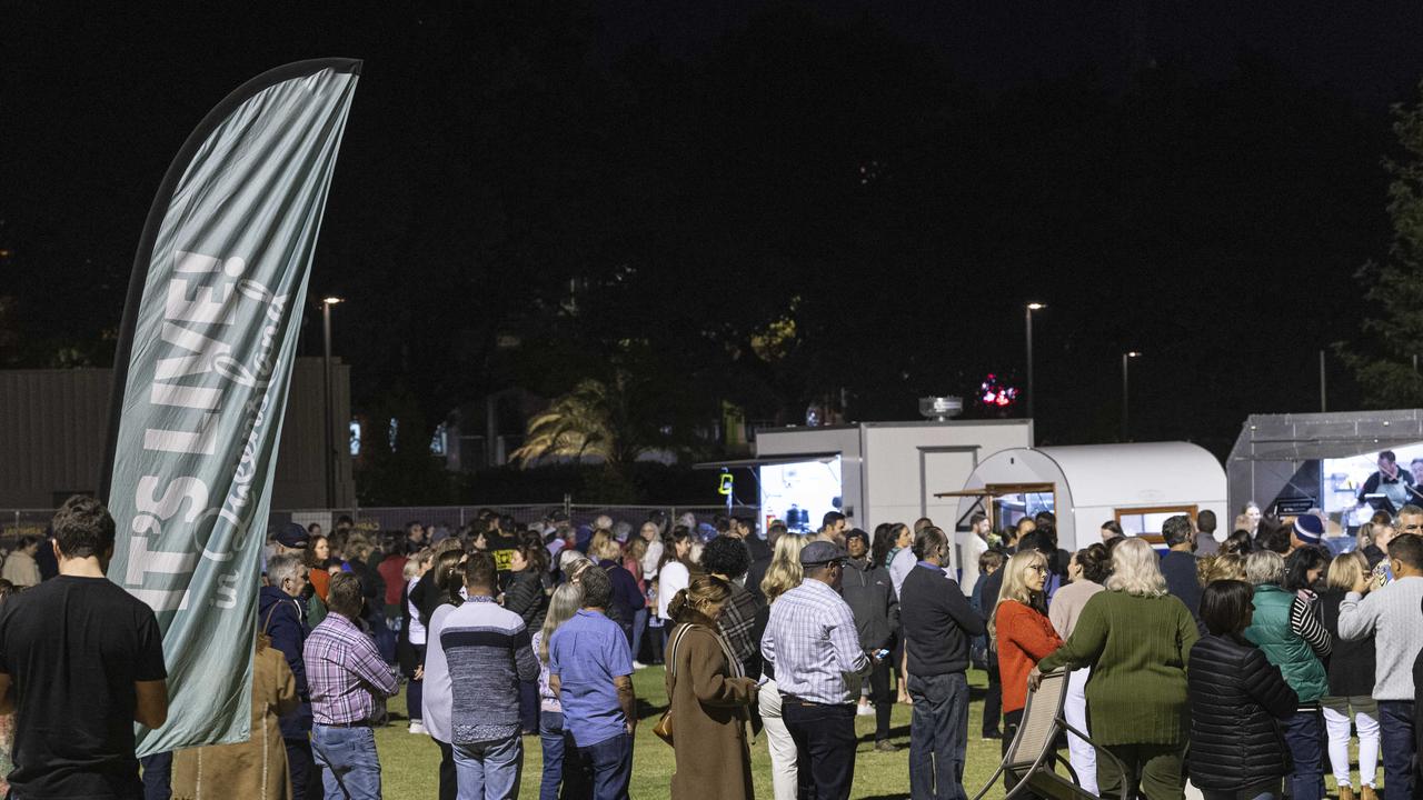 The lines for the food vans at the Symphony Under the Stars concert performed by the Queensland Symphony Orchestra in Queens Park Amphitheatre for Carnival of Flowers, Friday, October 4, 2024. Picture: Kevin Farmer