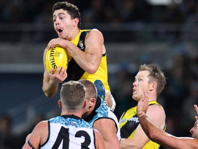 Jason Castagna soars for a mark in the final quarter. Picture: AAP