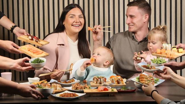 Kayla Green, Logan Green, 11 months, Dominic Green and Elaina Green, 2, enjoy the all-you-can-eat offering from Nijumaru Japanese Restaurant in Prospect. Picture: Emma Brasier