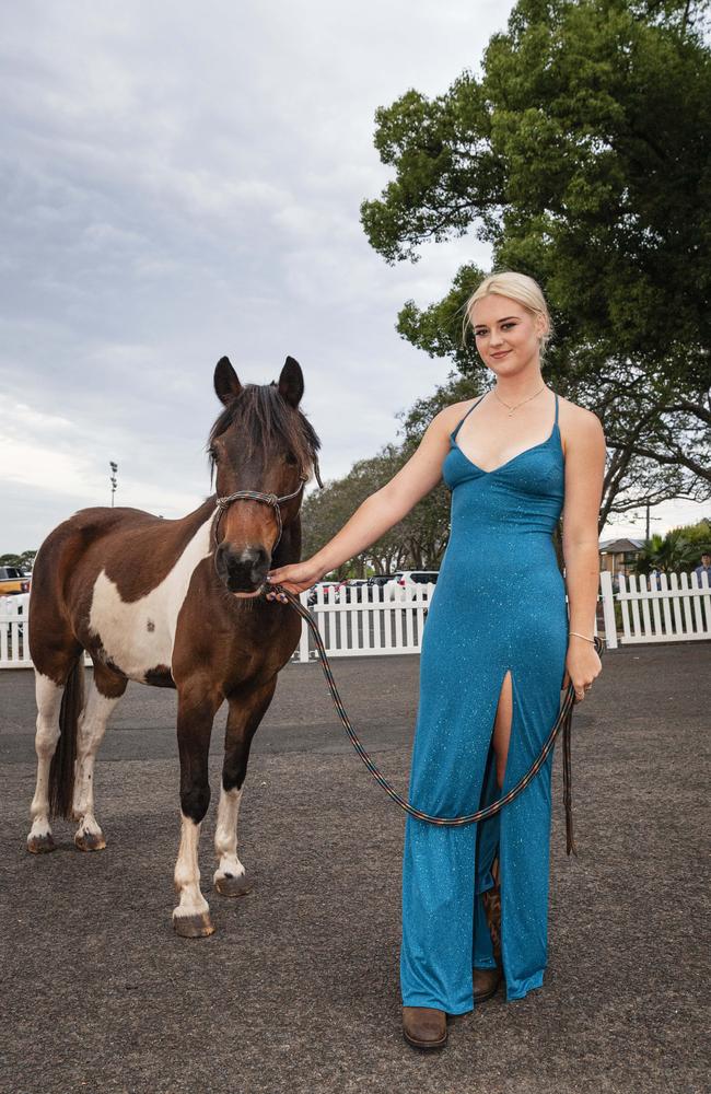 Graduate Caoilainn Finn with Murphy at The Industry School formal at Clifford Park Racecourse, Tuesday, November 12, 2024. Picture: Kevin Farmer