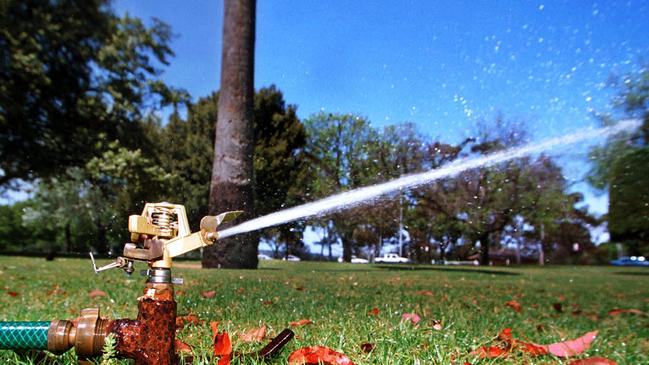 29 Oct 2002 - Sprinkler on in South Parklands, Adelaide. sprinklers watering water gardening generic